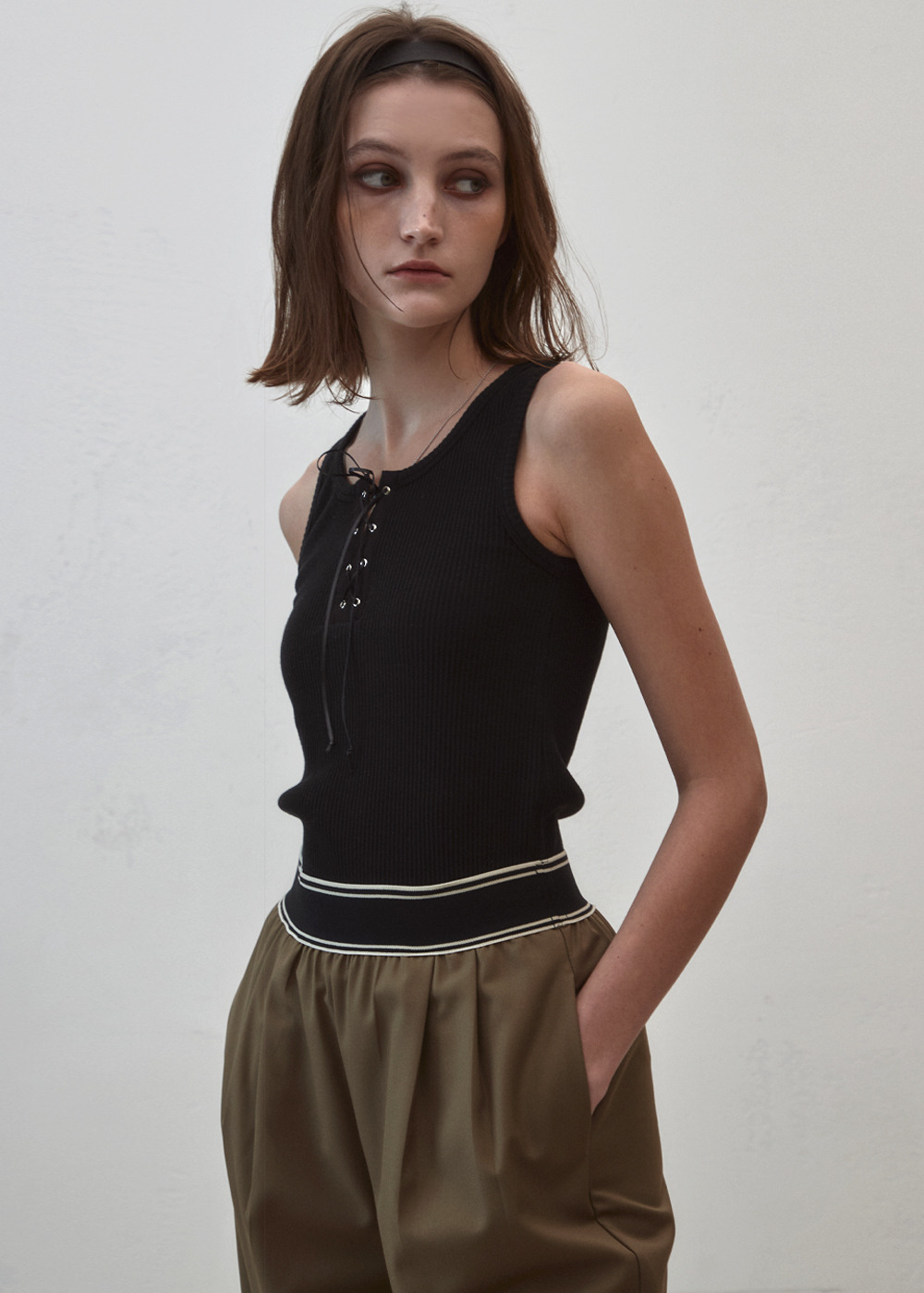 [SIGREAT시그레이트]RIBBED LACE-UP TOP_ BLACK [W CONCEPT]