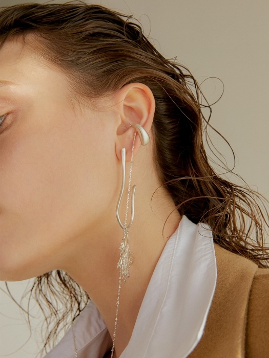 ice cubes and chain ear-cuff