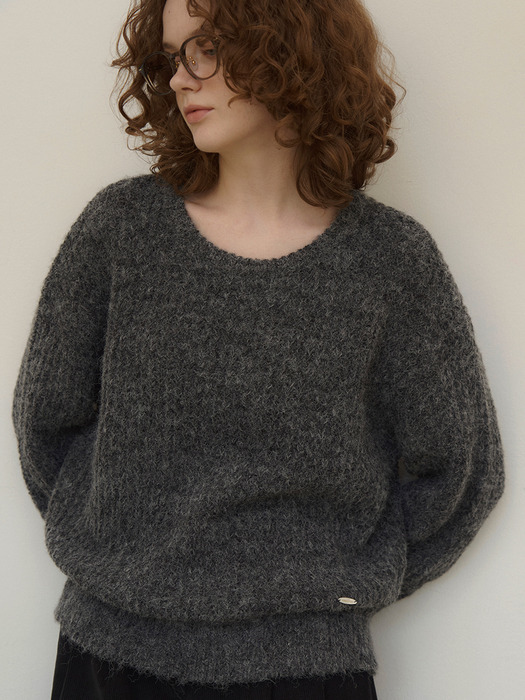 Touched round-neck wool knit