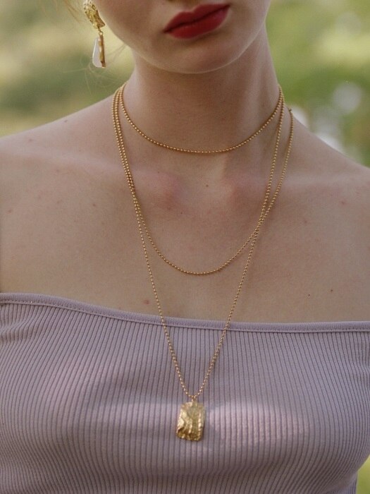 gold pebble necklace