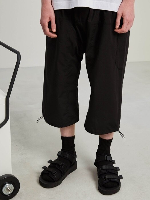 Unbalanced drape pants