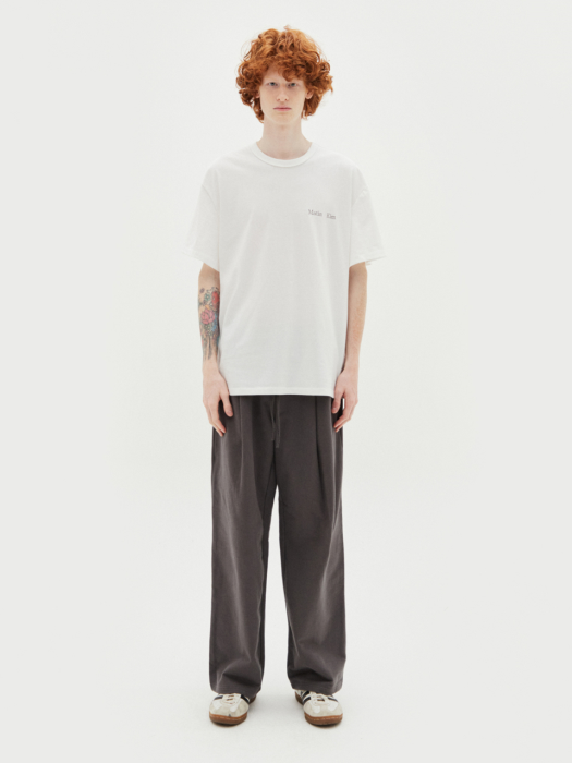MATIN SYMBOL ONE TUCK SWEATPANTS IN CHARCOAL