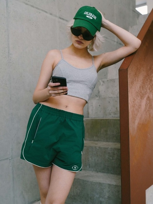 Piping line Essential logo Track shorts Green