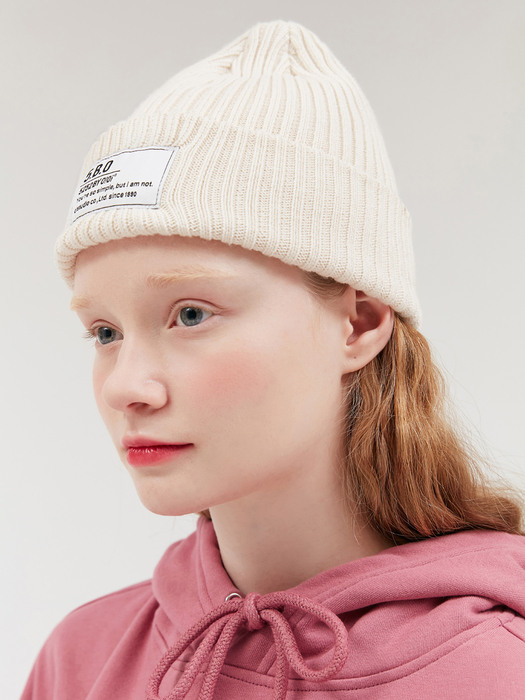 TAG LABEL BEANIE [CREAM]