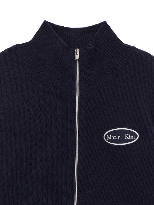 HIGH NECK ZIP CARDIGAN IN NAVY