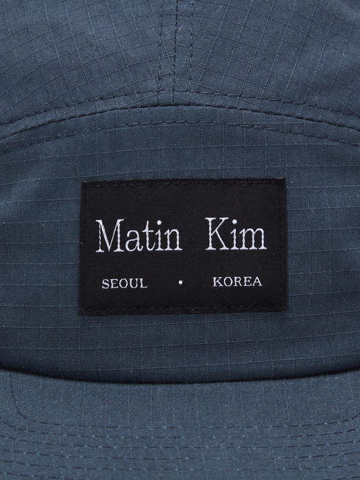 Matin Kim마뗑킴]LOGO LABEL SOLID CAMP CAP IN DARK GREEN