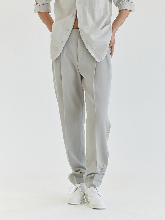 TWISTED SEAM TAPERED PANTS LIGHT GREY