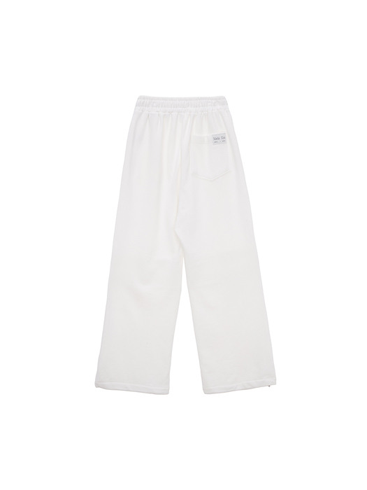 KNEE CUT OUT SWEATPANTS IN WHITE