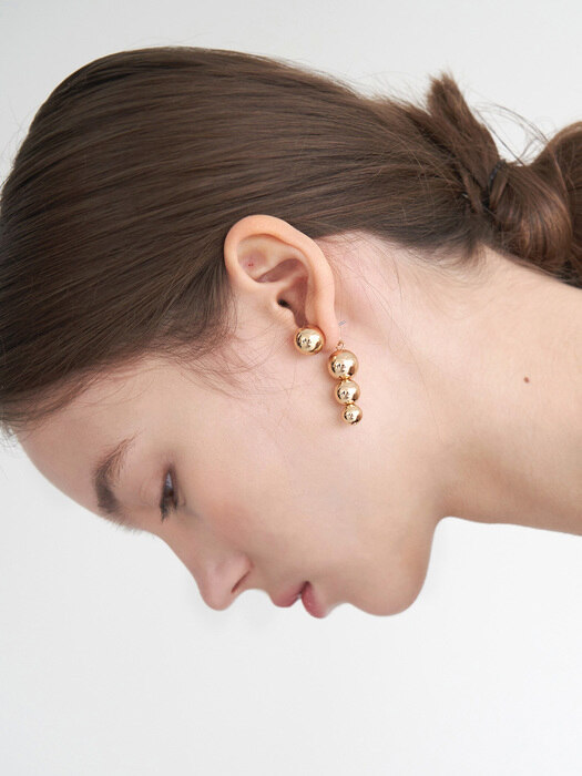Somos gold earring
