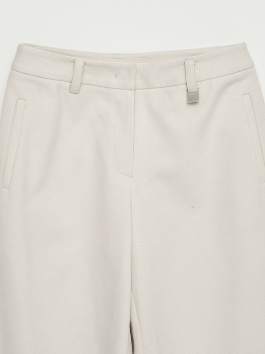DIAGONAL TWO WAY TROUSER IN IVORY