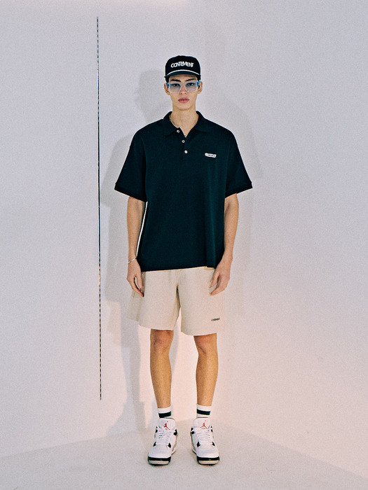 RELAXED-FIT COTTON PIQUE POLO SHIRT_BLACK