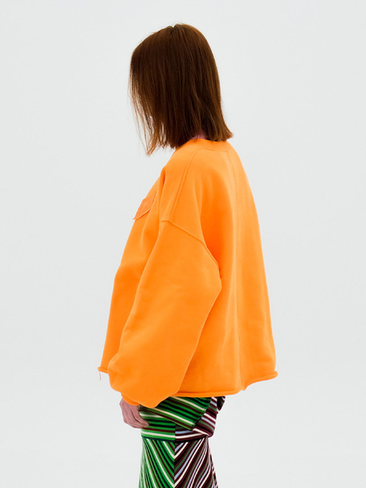 Raw edge crewneck sweatshirt in orange