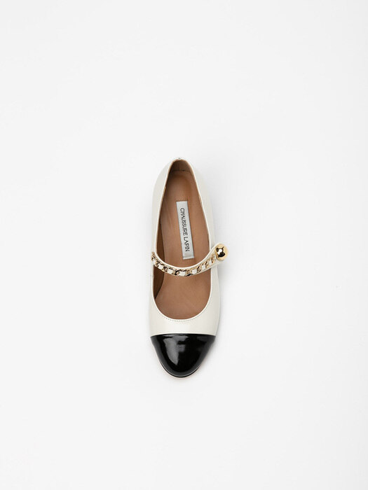 Aria Chained Maryjane Pumps Low in Textured Ivory with Textured Black