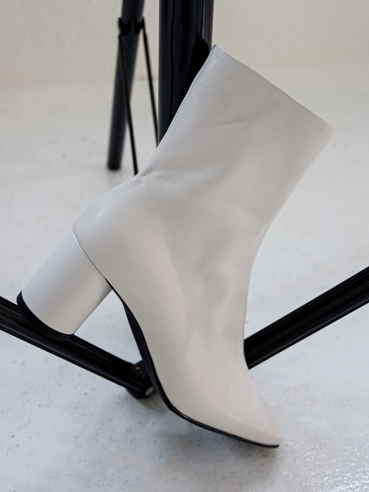 all-white cowhide ankle boots