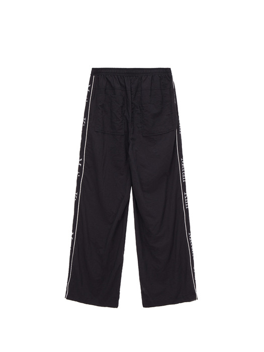 MATIN SPELL TRACK PANTS IN BLACK