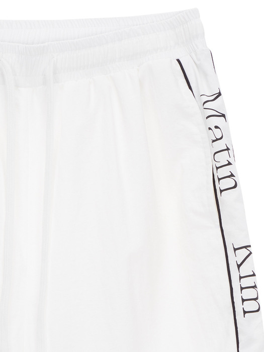 MATIN SPELL TRACK PANTS IN WHITE