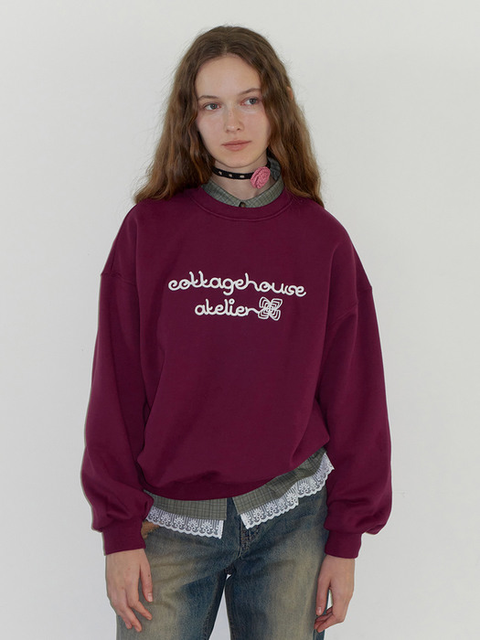 Atelier handle embroidery sweatshirt. Wine