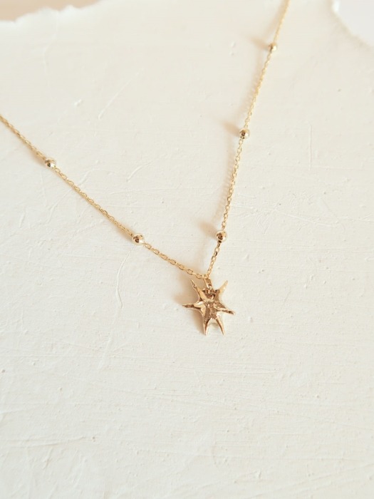 Holiday star necklace