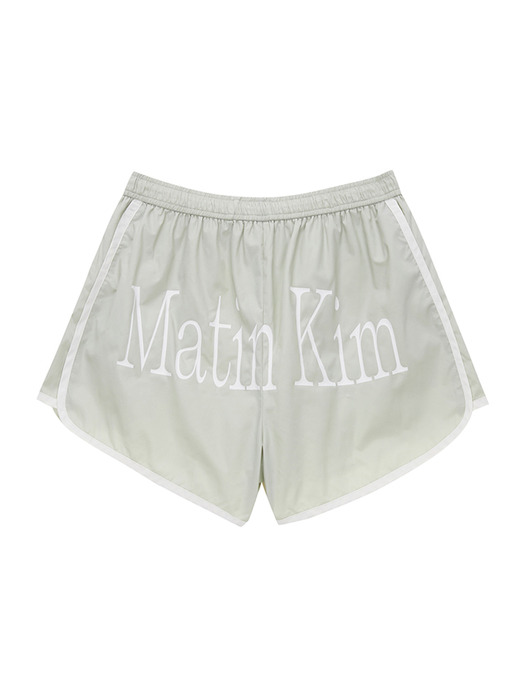 MATIN NYLON DOLPHIN SHORTS IN LIGHT KHAKI