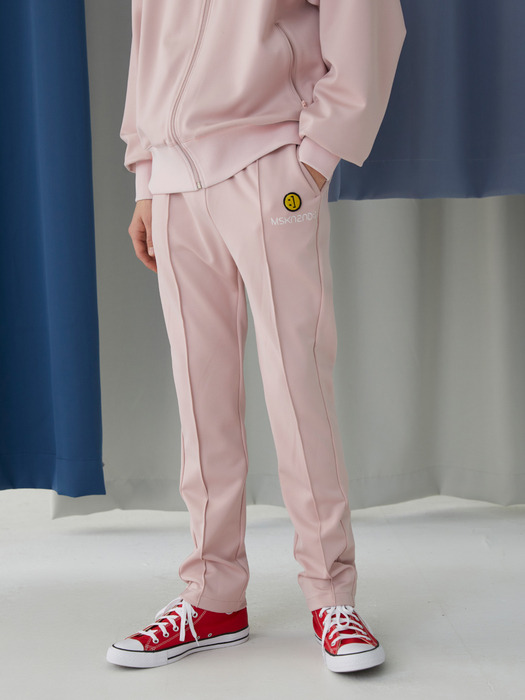 SM:]E PATCH TRACK PANTS BABY PINK