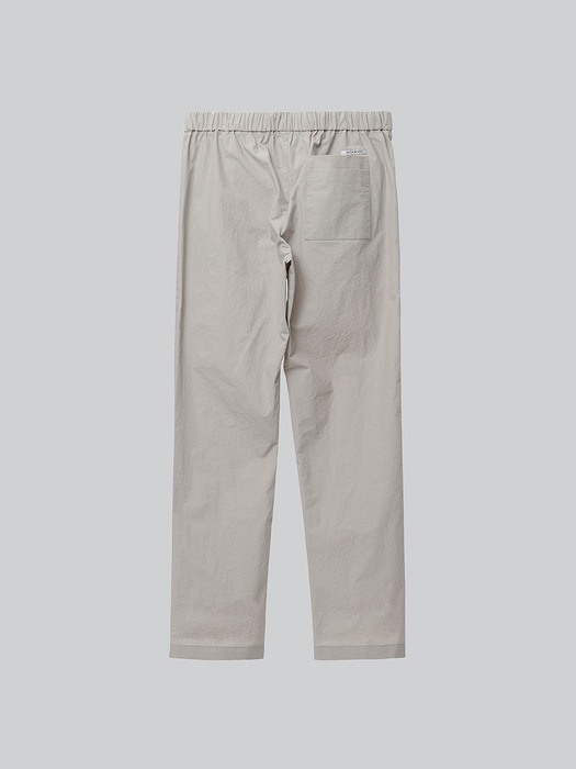 DOUBLE POCKET RELAXED TROUSERS-SAND BEIGE