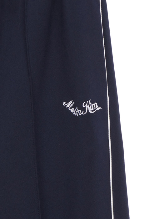 SLIMFIT COLOR TRACK PANTS IN NAVY