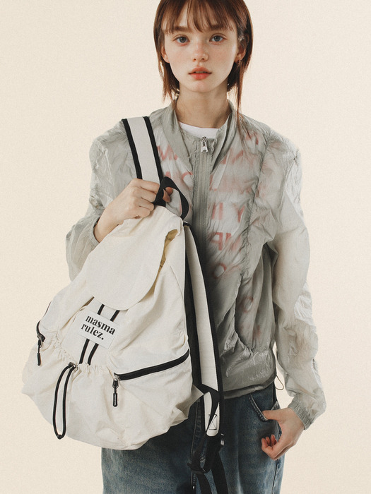 String flap backpack _ Ivory