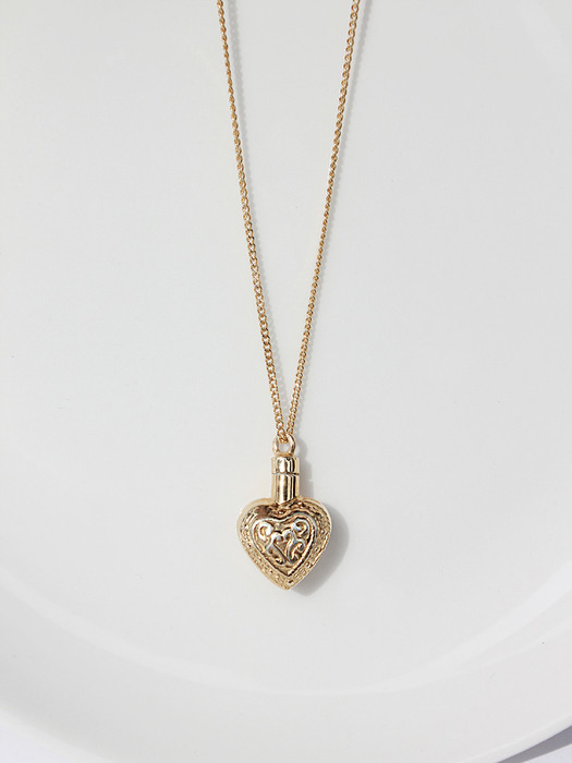 Antique heart bottle necklace