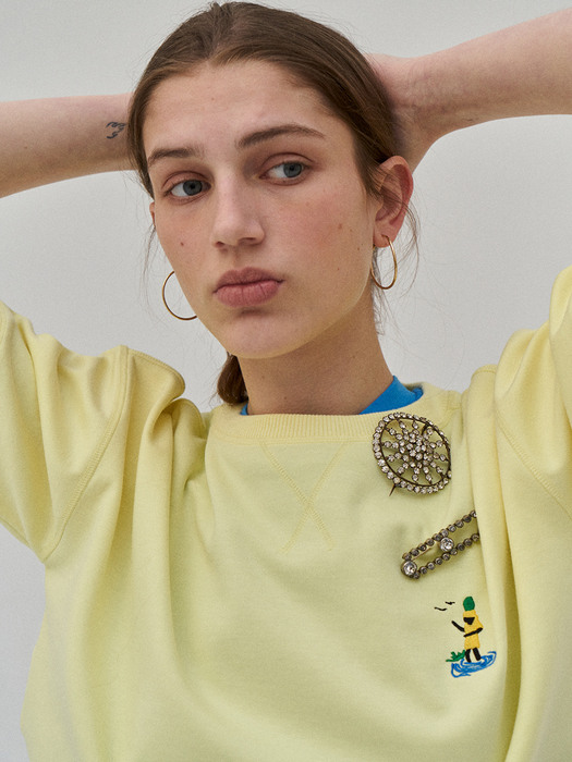 Sweat top with embroidery in lemon yellow