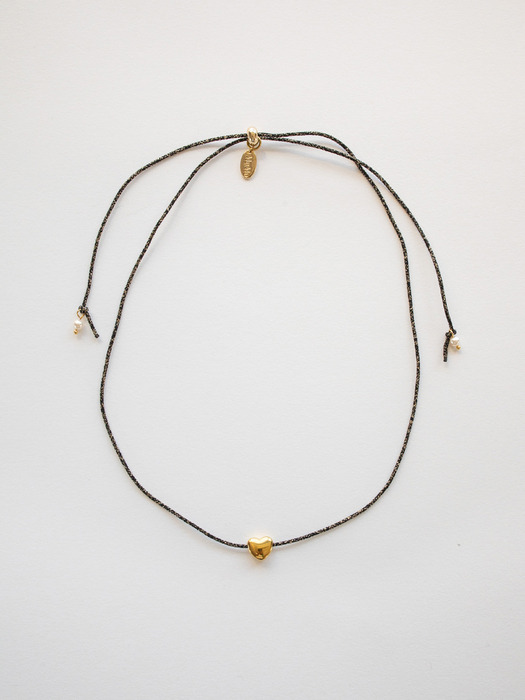Gold heart with black metallic string necklace