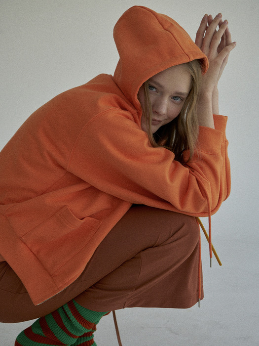 Orange zip hoodie with signature puller 