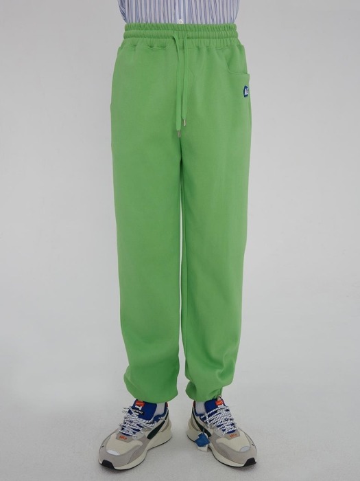 Stone logo track trousers Neon green