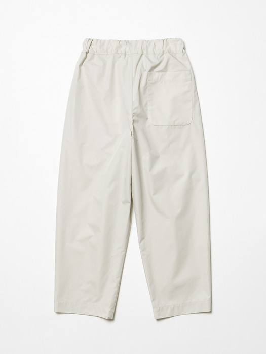 Compact yarn carrot-fit pants Ivory