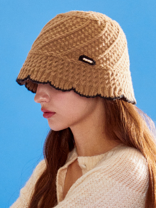 Deep beige knitted bucket hat