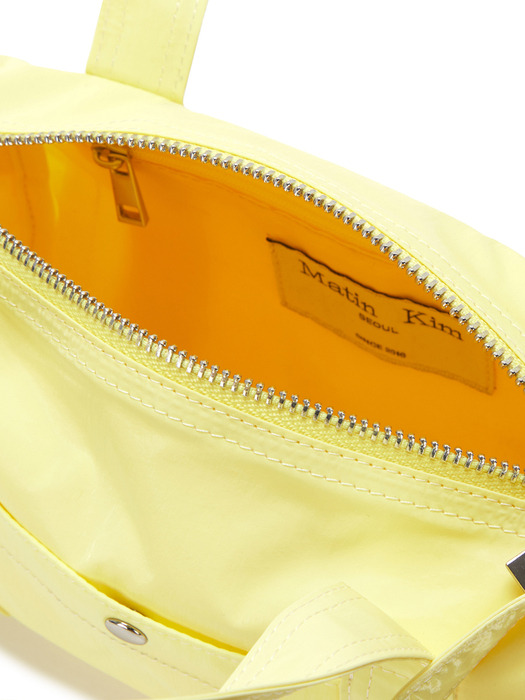 GLOSSY LOGO SPORTY MINI DUFFEL BAG IN LIGHT YELLOW