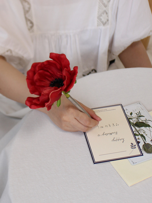 dark red lovely anemone flower pen