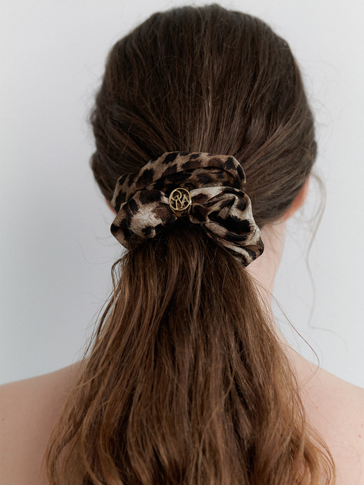 Leopard symbol scrunchie