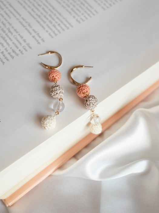 Long connected knit balls earring