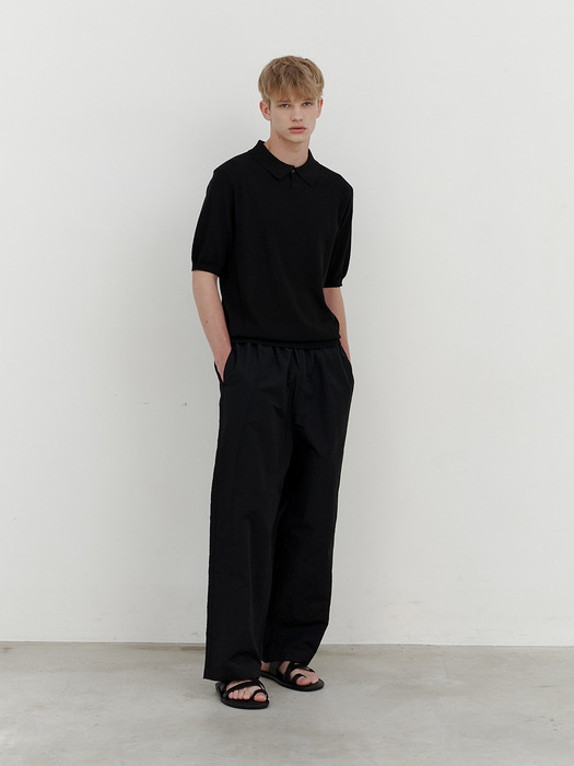 Twisted curved roll-up pants (black)