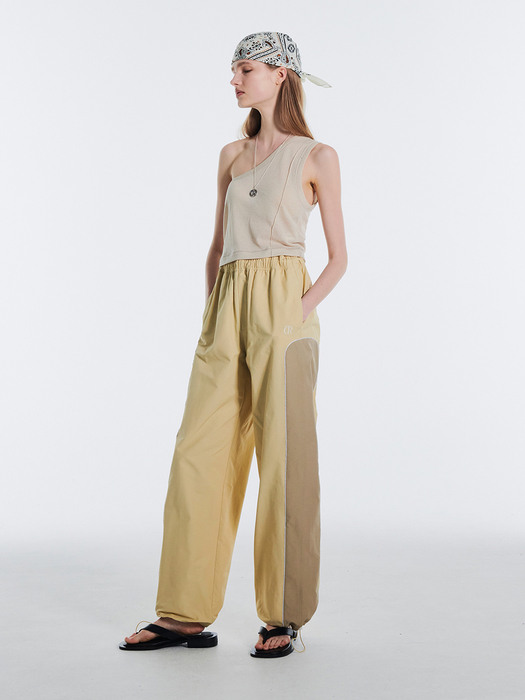 WIDE ROUNDING TRACK PANTS KS [PALE YELLOW]