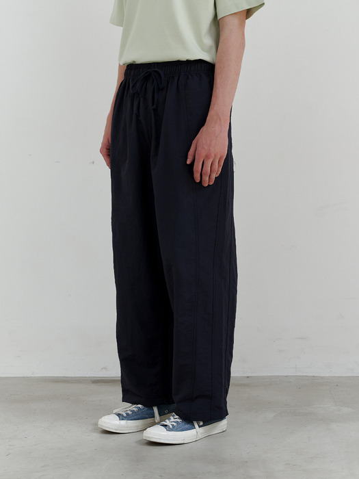 Twisted curved roll-up pants (navy)