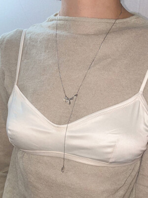 Bow point long surgical necklace