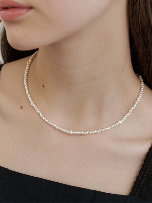 heart in pearl necklace