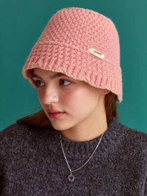 Soft pink knitted bucket hat