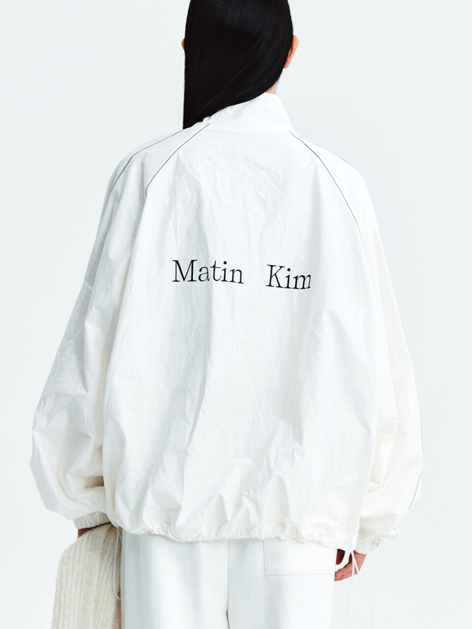 MATIN KIM LOGO COATING JUMPER IN IVORY