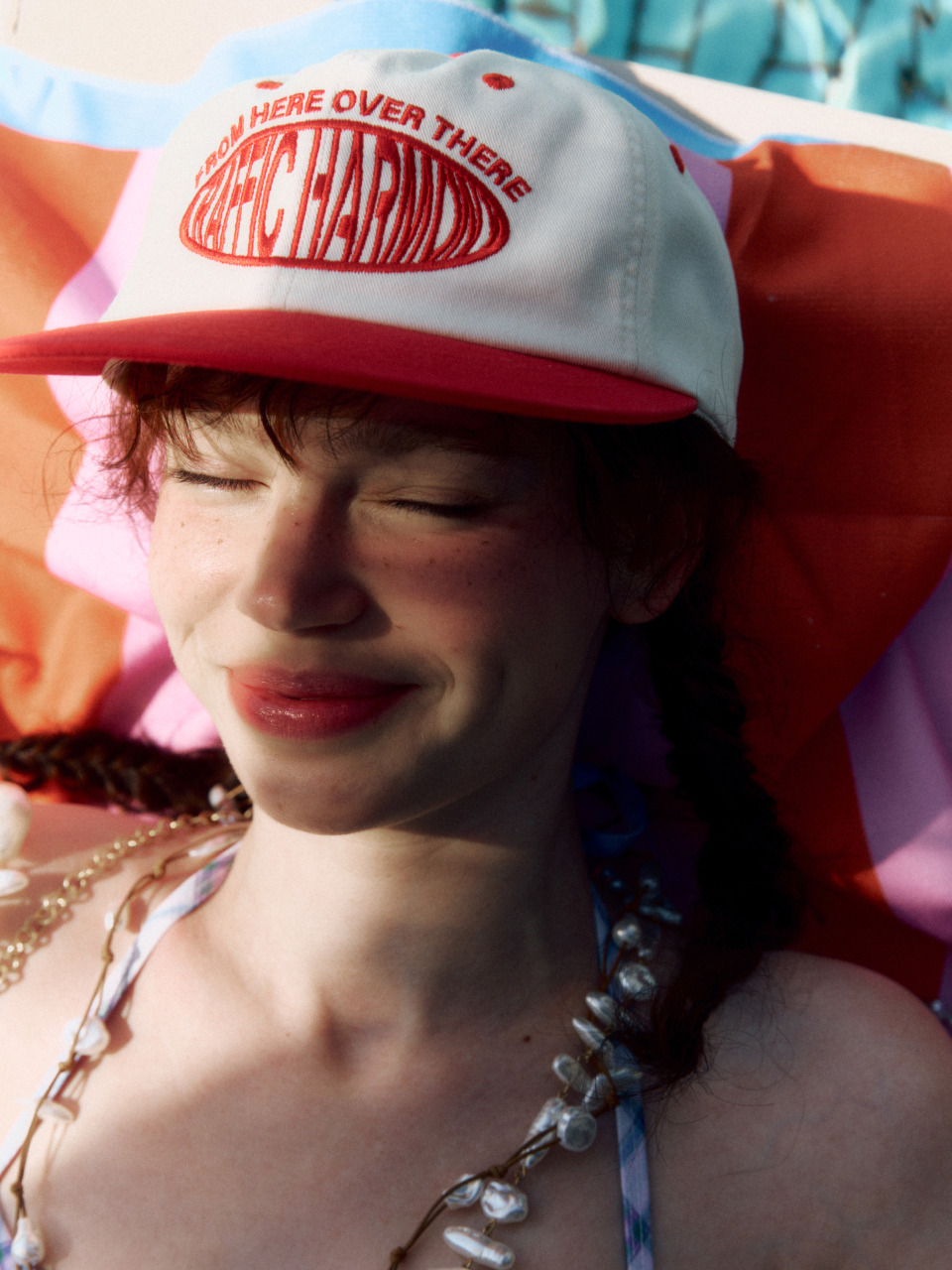 ROUND LOGO TRUCKER HAT RED